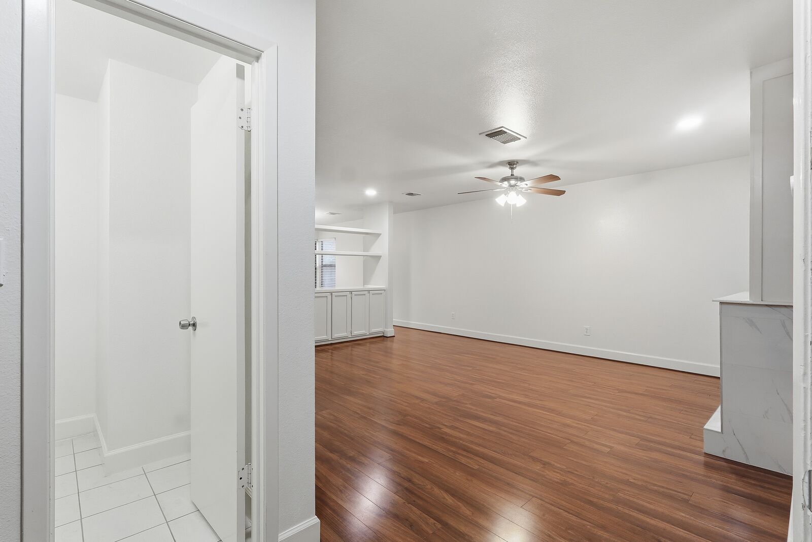 Entry with tile flooring opening into the living room