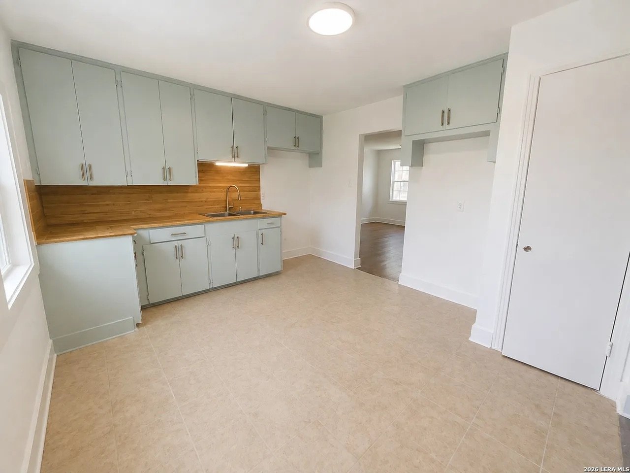 Kitchen — wide view of custom cabinets and counter space