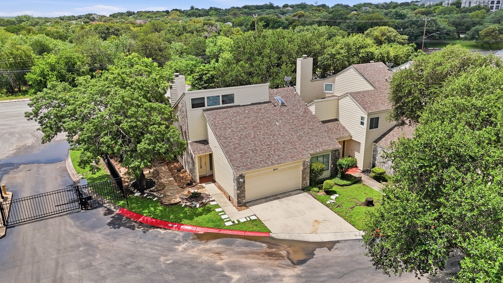Aerial view of 8515 Echo Creek Lane and the Echo Creek community (photo 5 of 71)