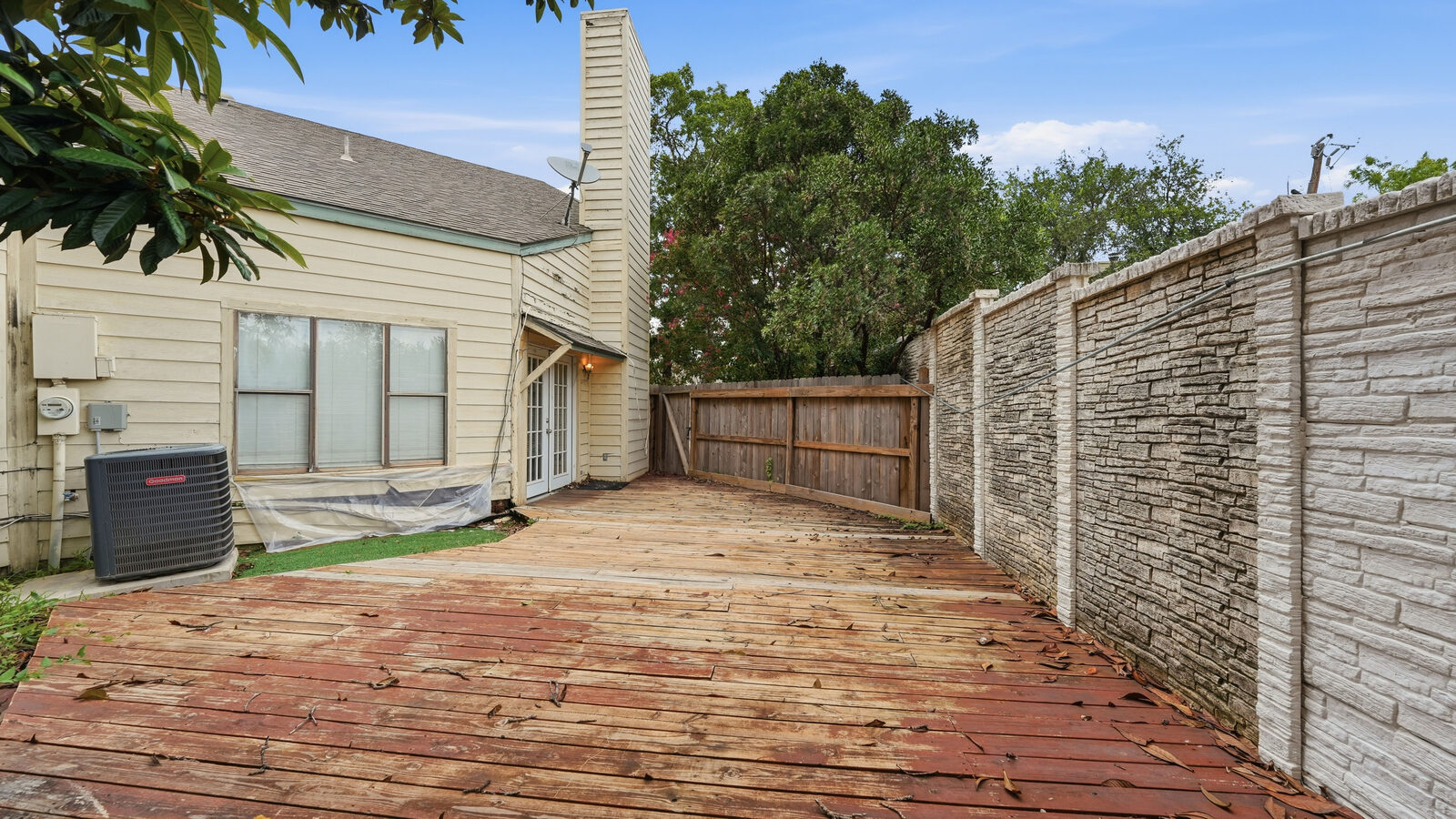 Front exterior — two-car garage with the address number 8515 visible