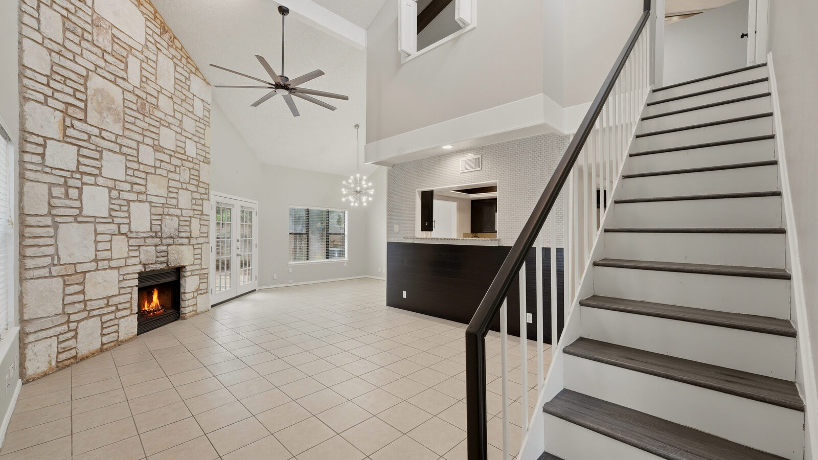 Backyard deck and door leading into the home