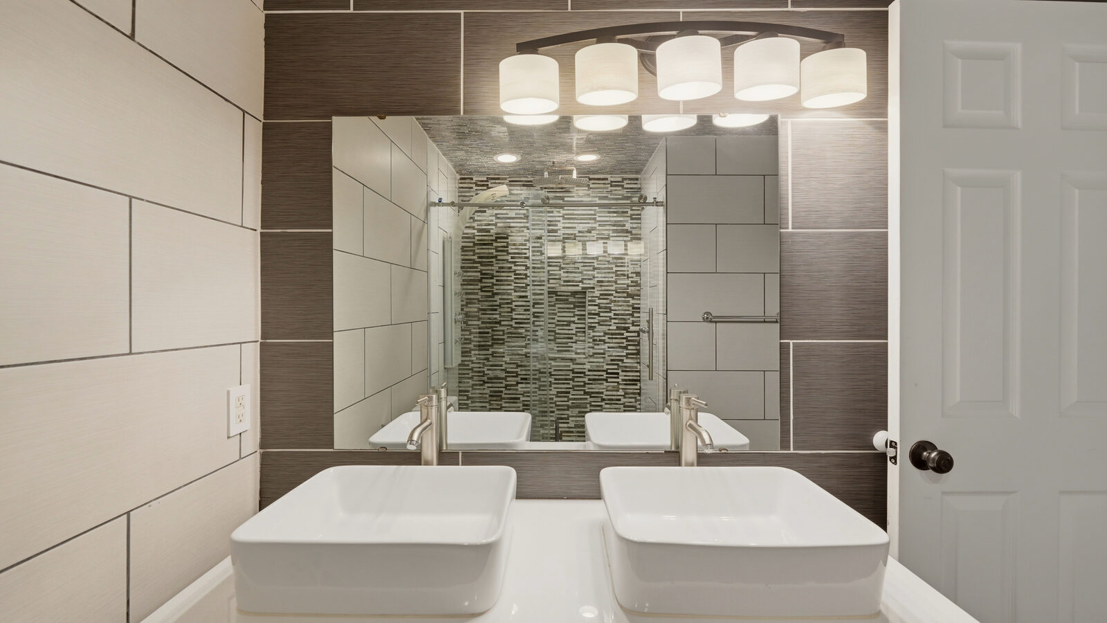 Recently updated bathroom with mosaic-tile tub/shower combo